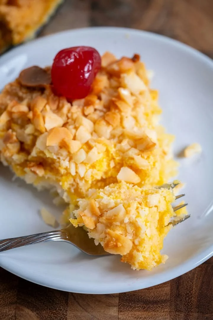 Delicious Fool's Cake topped with fresh fruits and whipped cream.