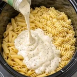 A delicious bowl of easy slow cooker pasta with fresh ingredients.