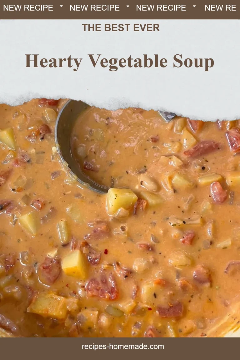 Bowl of hearty vegetable soup filled with colorful vegetables and herbs