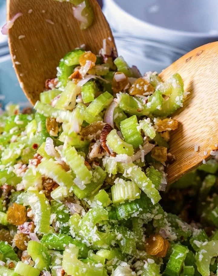 A bowl of the most delicious salad with colorful vegetables and dressing.