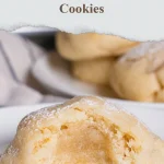 Freshly baked perfectly chewy cookies on a cooling rack.