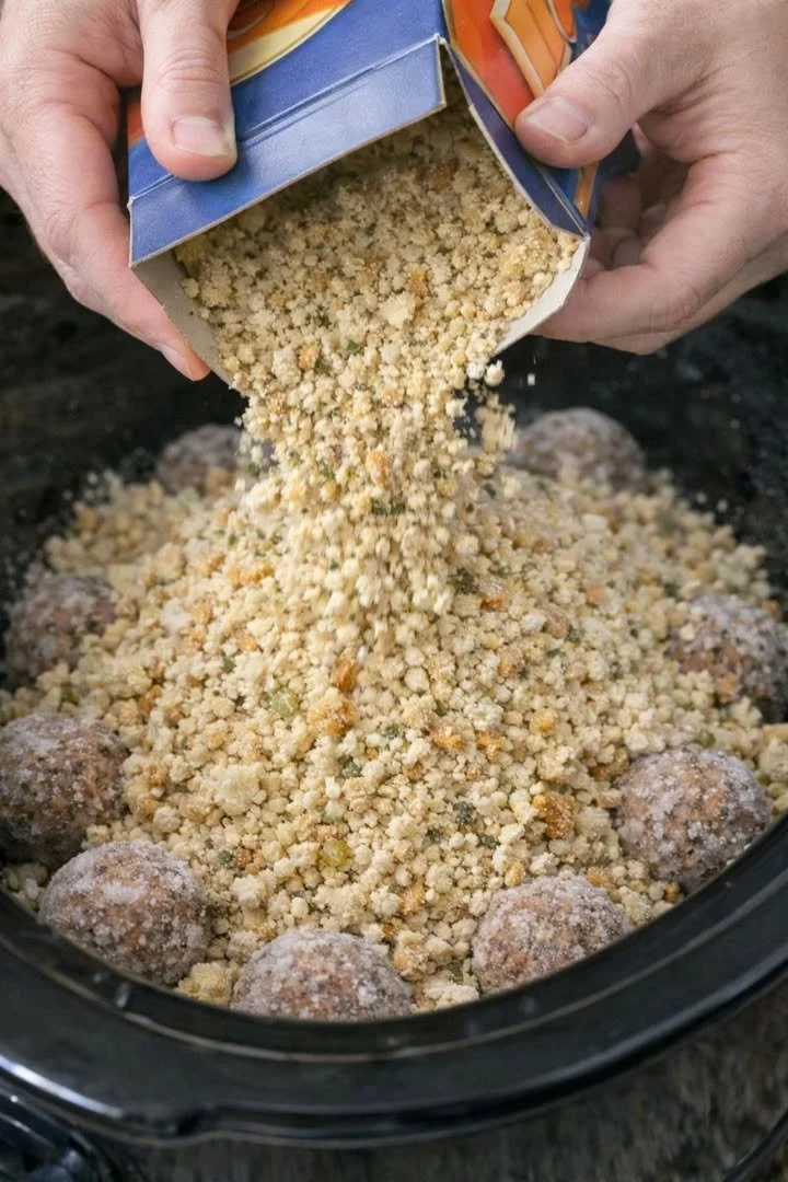 Delicious Slow Cooker Meatball Stuffing in a serving bowl