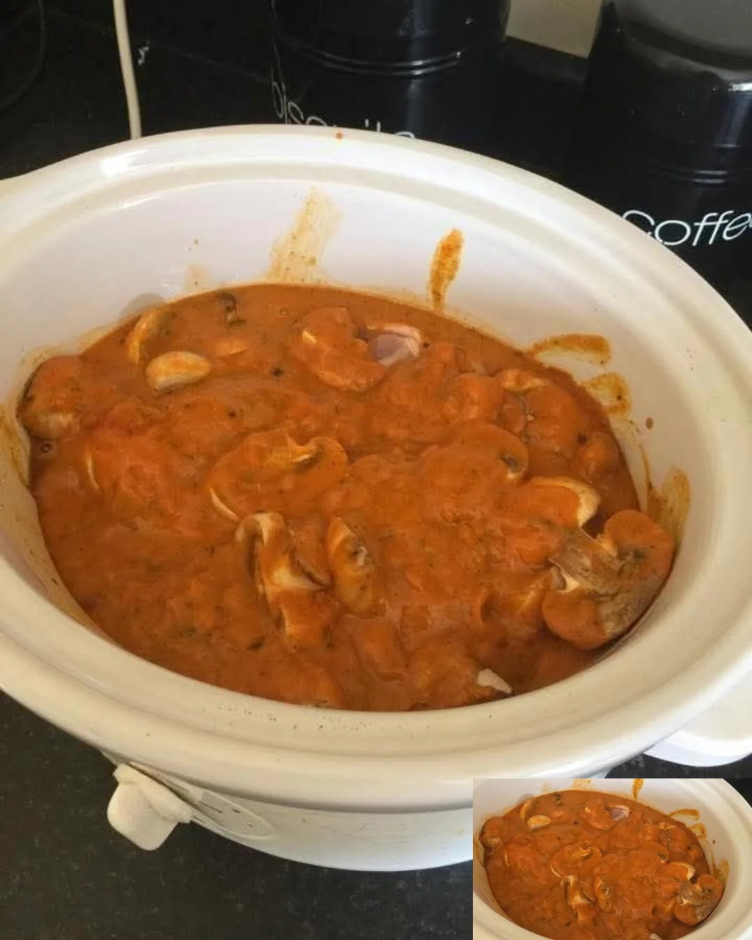Slow cooker chicken curry in a bowl with aromatic spices and vegetables