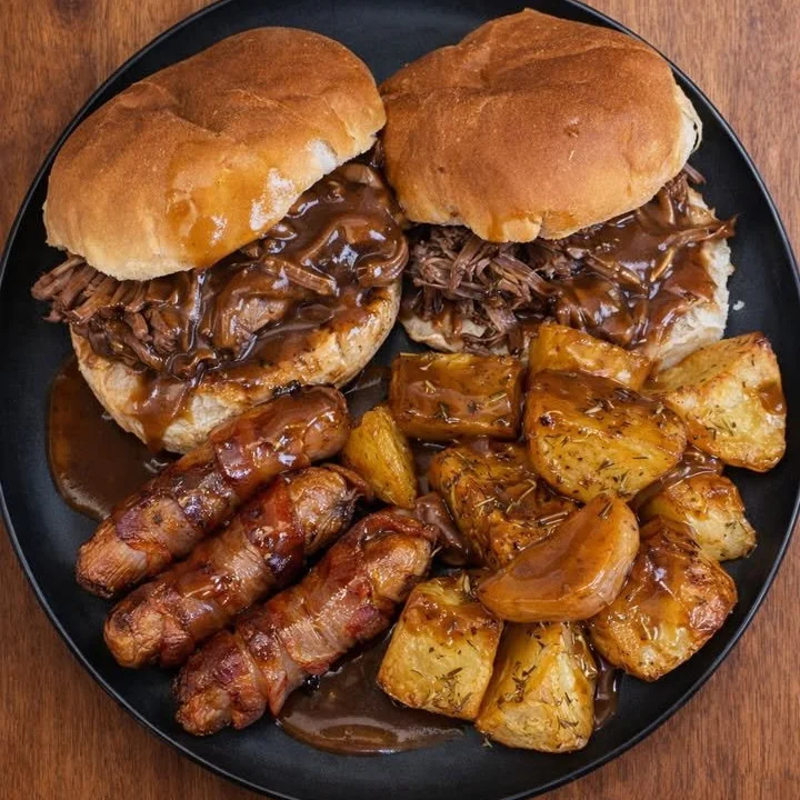 Slow Cooked Beef Buns with Roasties and Pigs in Blankets
