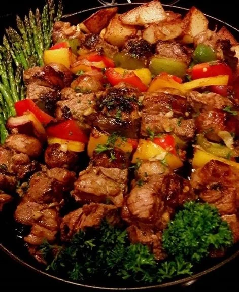 Chicken, bacon, and pineapple kebabs ready for grilling