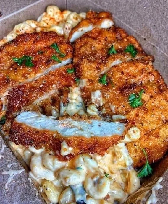 Honey glaze sweet and spicy fried chicken served with buttermilk mac and cheese