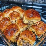 Delicious Philly cheesesteak sliders plated for a tempting appetizer.