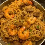 Shrimp Teriyaki Noodles with steak served in a bowl
