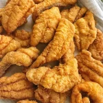 Southern Fried Catfish dish served crispy with sides