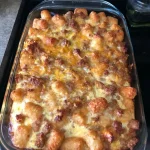 Tater Tot Sausage Breakfast Casserole ready to serve on a rustic dining table